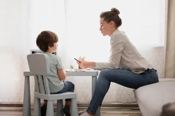 side-view-woman-tutoring-child-home_23-2148524521 (1)